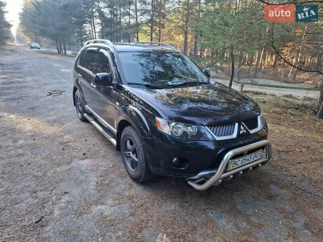 Черный Мицубиси Аутлендер ХЛ, объемом двигателя 2.4 л и пробегом 127 тыс. км за 10500 $, фото 23 на Automoto.ua