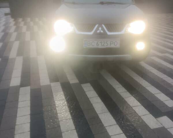 Черный Мицубиси Аутлендер ХЛ, объемом двигателя 2.36 л и пробегом 270 тыс. км за 9200 $, фото 26 на Automoto.ua