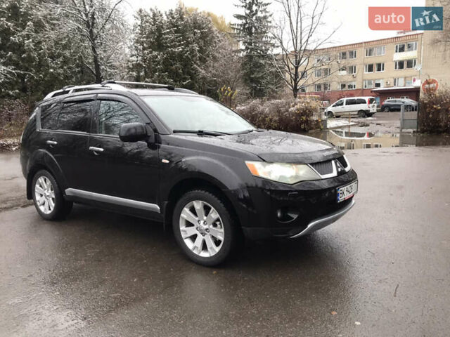 Чорний Міцубісі Аутлендер ХЛ, об'ємом двигуна 2 л та пробігом 306 тис. км за 9799 $, фото 8 на Automoto.ua