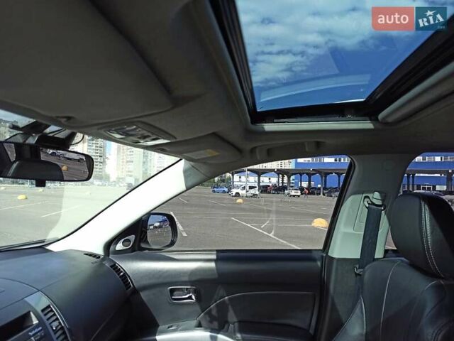 Черный Мицубиси Аутлендер ХЛ, объемом двигателя 2.4 л и пробегом 212 тыс. км за 9350 $, фото 2 на Automoto.ua