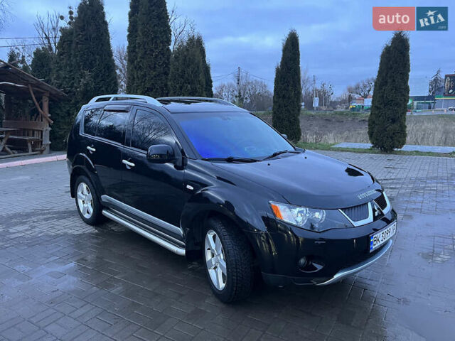 Чорний Міцубісі Аутлендер ХЛ, об'ємом двигуна 2.36 л та пробігом 230 тис. км за 9400 $, фото 4 на Automoto.ua