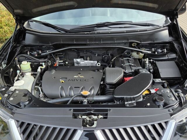 Черный Мицубиси Аутлендер ХЛ, объемом двигателя 2.4 л и пробегом 31 тыс. км за 15000 $, фото 18 на Automoto.ua