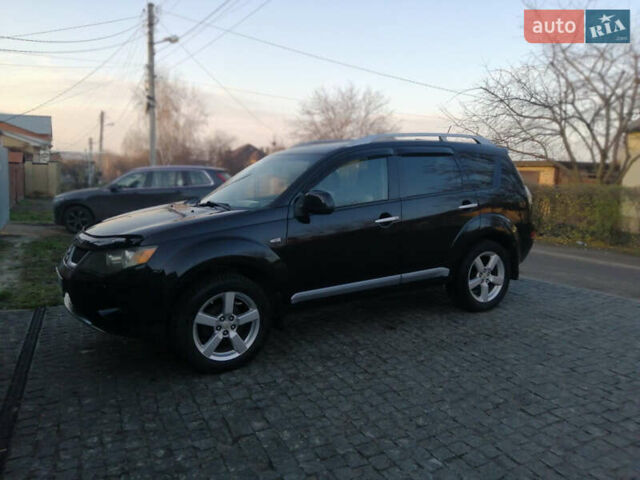 Чорний Міцубісі Аутлендер ХЛ, об'ємом двигуна 2.38 л та пробігом 228 тис. км за 7850 $, фото 6 на Automoto.ua