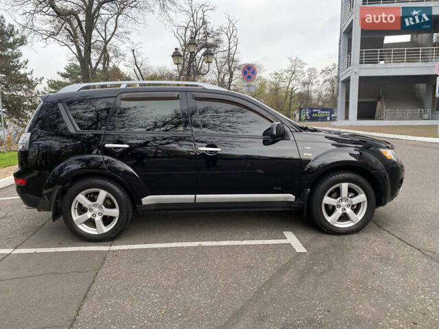 Черный Мицубиси Аутлендер ХЛ, объемом двигателя 3 л и пробегом 154 тыс. км за 8900 $, фото 9 на Automoto.ua
