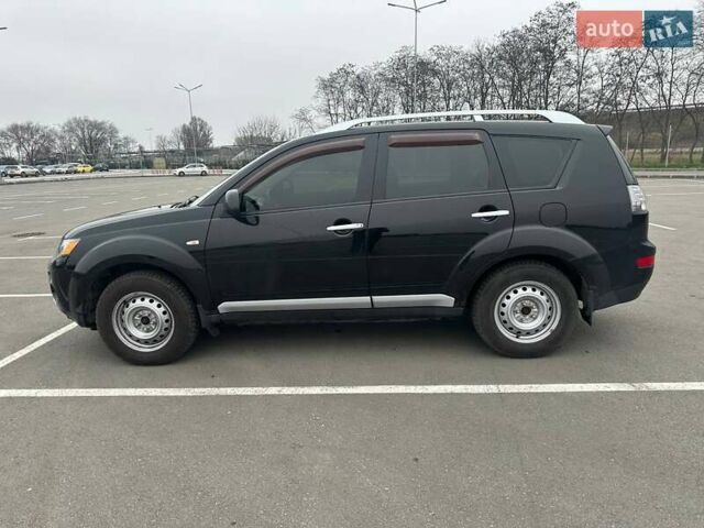Черный Мицубиси Аутлендер ХЛ, объемом двигателя 2.36 л и пробегом 250 тыс. км за 10000 $, фото 7 на Automoto.ua