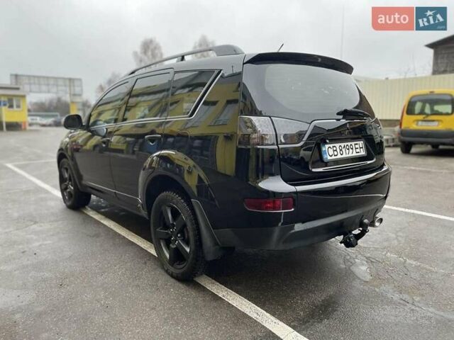 Черный Мицубиси Аутлендер ХЛ, объемом двигателя 2.4 л и пробегом 198 тыс. км за 9200 $, фото 14 на Automoto.ua