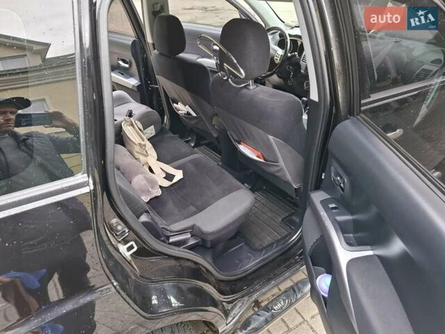 Черный Мицубиси Аутлендер ХЛ, объемом двигателя 2.4 л и пробегом 127 тыс. км за 10500 $, фото 36 на Automoto.ua