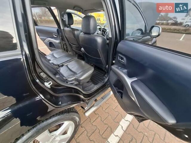 Черный Мицубиси Аутлендер ХЛ, объемом двигателя 2.36 л и пробегом 211 тыс. км за 10500 $, фото 16 на Automoto.ua