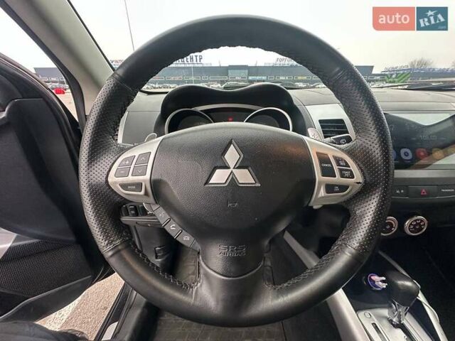 Черный Мицубиси Аутлендер ХЛ, объемом двигателя 2.36 л и пробегом 250 тыс. км за 10000 $, фото 16 на Automoto.ua