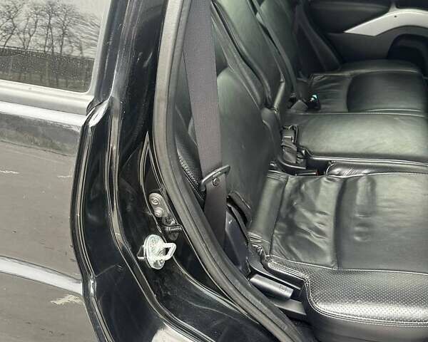 Черный Мицубиси Аутлендер ХЛ, объемом двигателя 2.36 л и пробегом 250 тыс. км за 10000 $, фото 22 на Automoto.ua