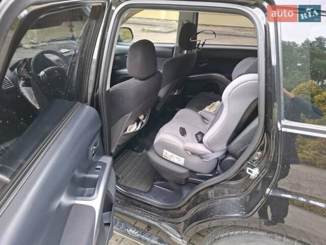 Черный Мицубиси Аутлендер ХЛ, объемом двигателя 2.4 л и пробегом 127 тыс. км за 10500 $, фото 33 на Automoto.ua