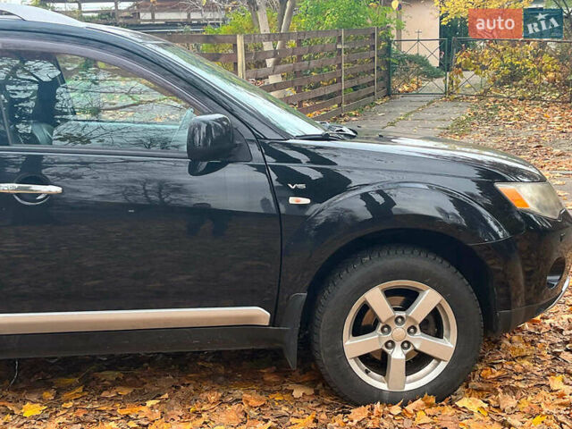 Черный Мицубиси Аутлендер ХЛ, объемом двигателя 3 л и пробегом 285 тыс. км за 9590 $, фото 15 на Automoto.ua