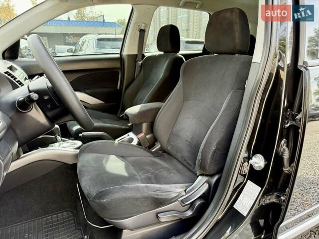 Чорний Міцубісі Аутлендер ХЛ, об'ємом двигуна 2.4 л та пробігом 104 тис. км за 10800 $, фото 6 на Automoto.ua