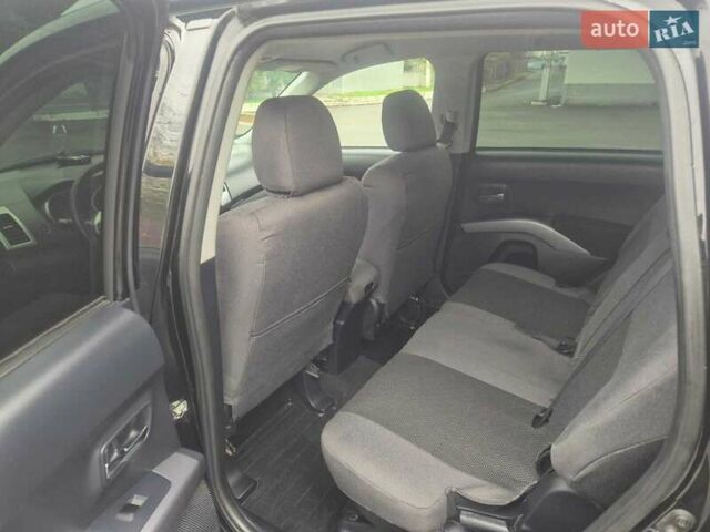 Черный Мицубиси Аутлендер ХЛ, объемом двигателя 2.36 л и пробегом 87 тыс. км за 11500 $, фото 7 на Automoto.ua