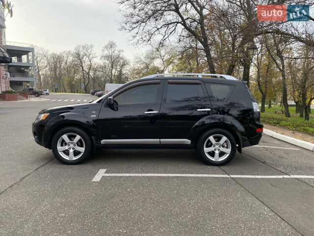 Черный Мицубиси Аутлендер ХЛ, объемом двигателя 3 л и пробегом 154 тыс. км за 8900 $, фото 4 на Automoto.ua