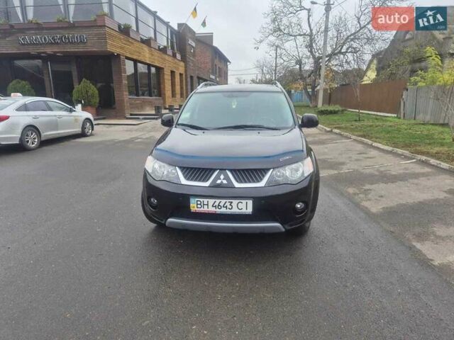 Черный Мицубиси Аутлендер ХЛ, объемом двигателя 2.36 л и пробегом 87 тыс. км за 11500 $, фото 18 на Automoto.ua