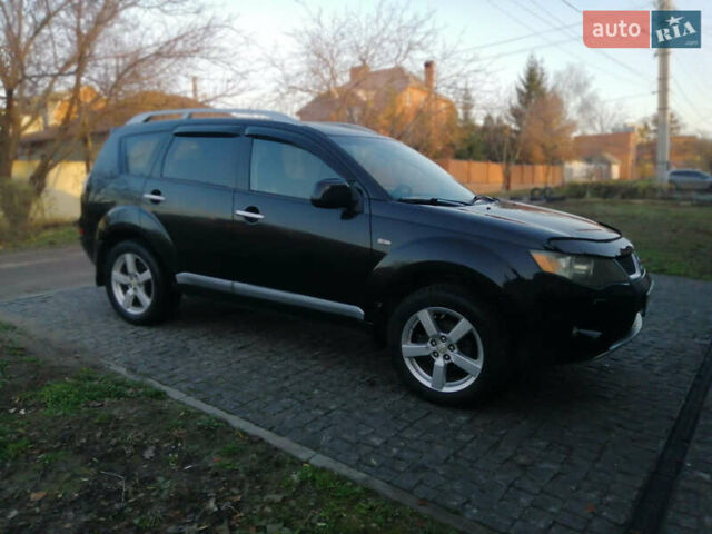 Чорний Міцубісі Аутлендер ХЛ, об'ємом двигуна 2.38 л та пробігом 228 тис. км за 7850 $, фото 2 на Automoto.ua