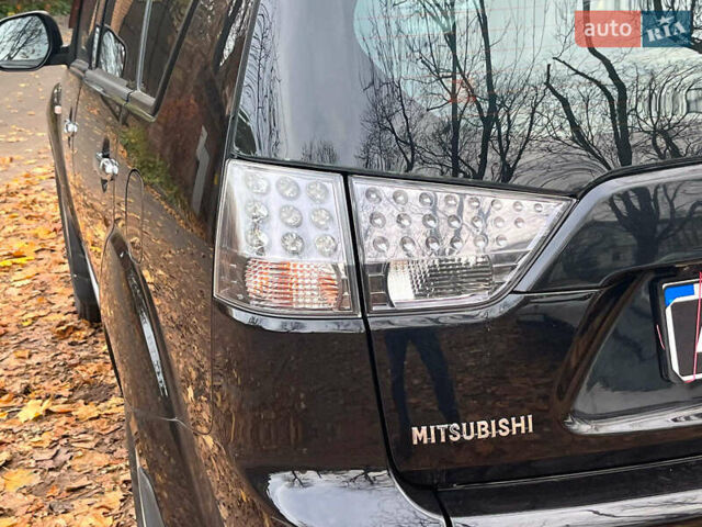Черный Мицубиси Аутлендер ХЛ, объемом двигателя 3 л и пробегом 285 тыс. км за 9590 $, фото 9 на Automoto.ua