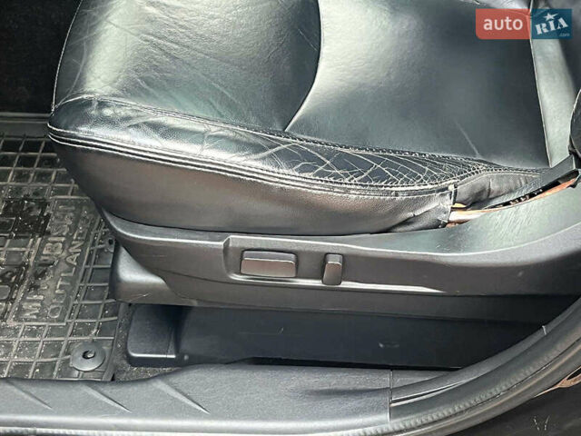 Черный Мицубиси Аутлендер ХЛ, объемом двигателя 3 л и пробегом 285 тыс. км за 9590 $, фото 29 на Automoto.ua
