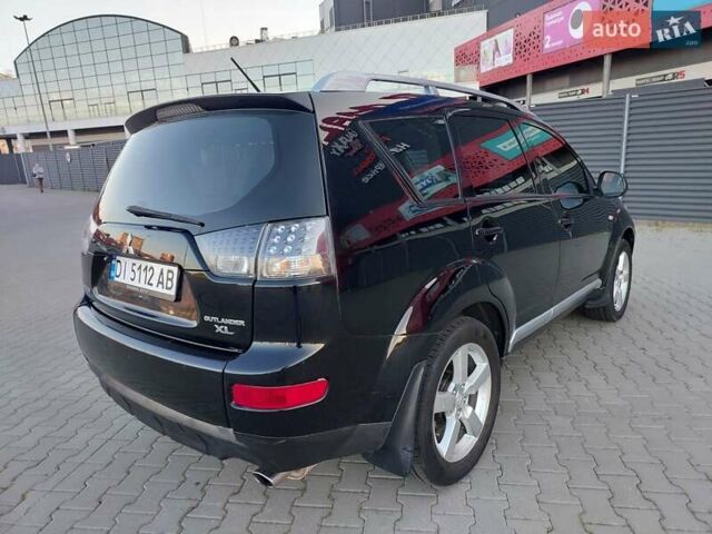Чорний Міцубісі Аутлендер ХЛ, об'ємом двигуна 2.4 л та пробігом 181 тис. км за 8990 $, фото 4 на Automoto.ua