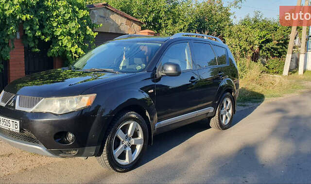 Чорний Міцубісі Аутлендер ХЛ, об'ємом двигуна 2.4 л та пробігом 325 тис. км за 7000 $, фото 16 на Automoto.ua