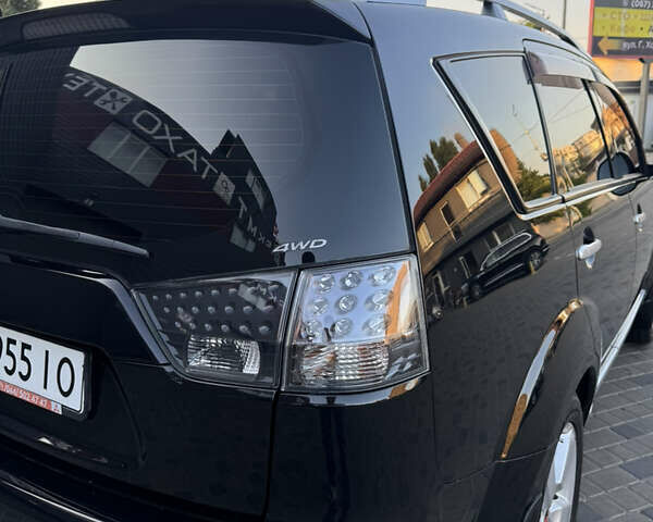 Чорний Міцубісі Аутлендер ХЛ, об'ємом двигуна 3 л та пробігом 243 тис. км за 12500 $, фото 15 на Automoto.ua