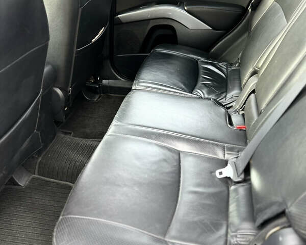 Черный Мицубиси Аутлендер ХЛ, объемом двигателя 2.4 л и пробегом 212 тыс. км за 9350 $, фото 28 на Automoto.ua