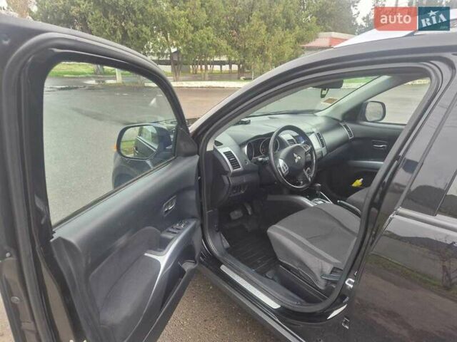 Черный Мицубиси Аутлендер ХЛ, объемом двигателя 2.36 л и пробегом 87 тыс. км за 11500 $, фото 13 на Automoto.ua