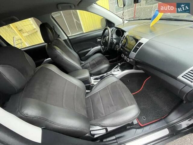 Черный Мицубиси Аутлендер ХЛ, объемом двигателя 2.4 л и пробегом 198 тыс. км за 9200 $, фото 10 на Automoto.ua