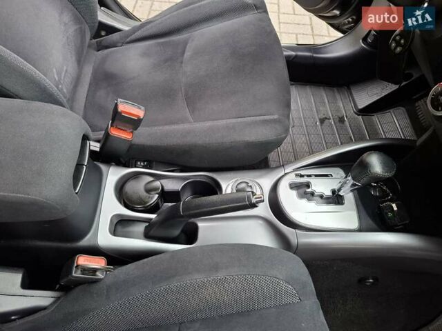 Черный Мицубиси Аутлендер ХЛ, объемом двигателя 2.4 л и пробегом 127 тыс. км за 10500 $, фото 39 на Automoto.ua