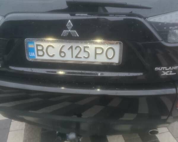 Черный Мицубиси Аутлендер ХЛ, объемом двигателя 2.36 л и пробегом 270 тыс. км за 9200 $, фото 7 на Automoto.ua