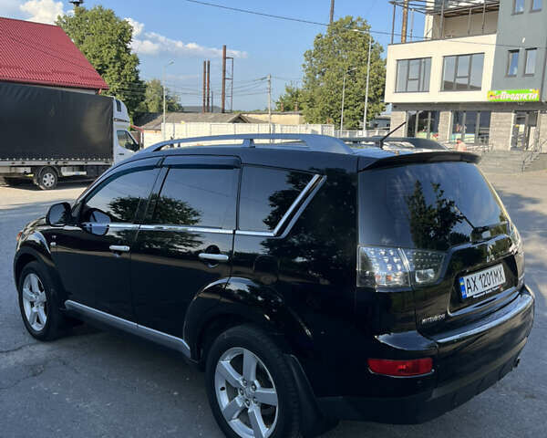 Черный Мицубиси Аутлендер ХЛ, объемом двигателя 2.99 л и пробегом 153 тыс. км за 10800 $, фото 16 на Automoto.ua