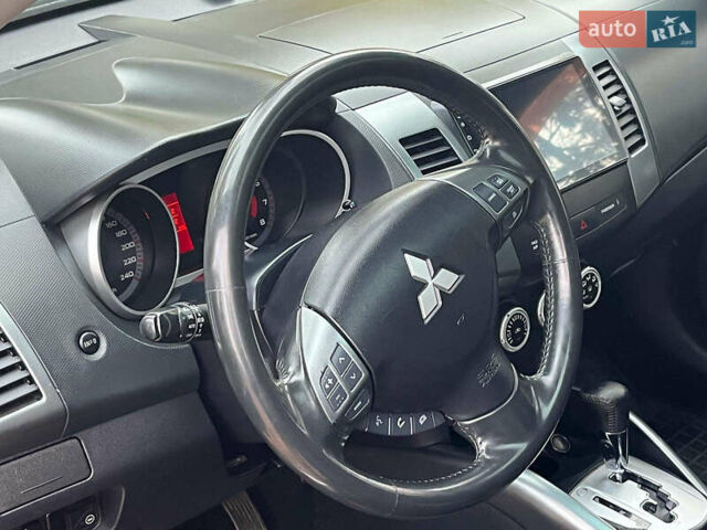 Черный Мицубиси Аутлендер ХЛ, объемом двигателя 3 л и пробегом 285 тыс. км за 9590 $, фото 30 на Automoto.ua