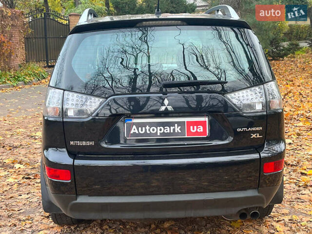 Черный Мицубиси Аутлендер ХЛ, объемом двигателя 3 л и пробегом 285 тыс. км за 9590 $, фото 8 на Automoto.ua