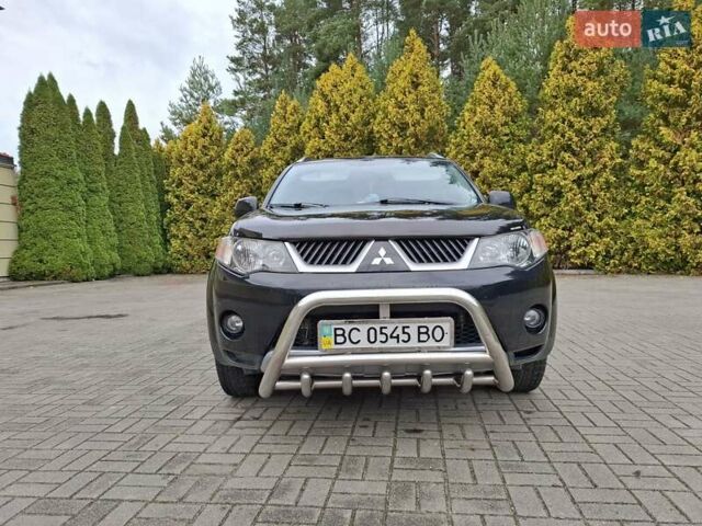 Черный Мицубиси Аутлендер ХЛ, объемом двигателя 2.4 л и пробегом 127 тыс. км за 10500 $, фото 15 на Automoto.ua