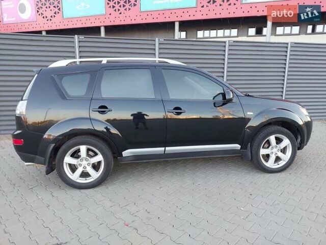 Чорний Міцубісі Аутлендер ХЛ, об'ємом двигуна 2.4 л та пробігом 181 тис. км за 8990 $, фото 9 на Automoto.ua