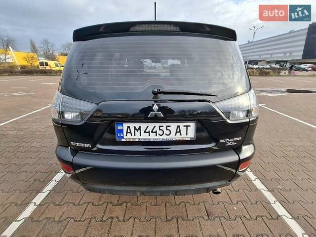 Черный Мицубиси Аутлендер ХЛ, объемом двигателя 2.36 л и пробегом 211 тыс. км за 10500 $, фото 4 на Automoto.ua