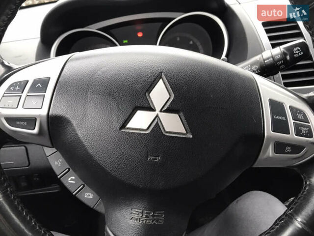 Чорний Міцубісі Аутлендер ХЛ, об'ємом двигуна 2 л та пробігом 306 тис. км за 9799 $, фото 22 на Automoto.ua