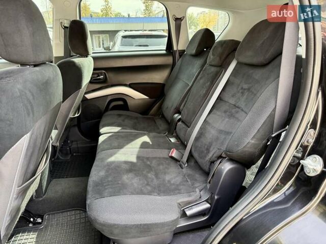 Чорний Міцубісі Аутлендер ХЛ, об'ємом двигуна 2.4 л та пробігом 104 тис. км за 10800 $, фото 7 на Automoto.ua