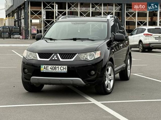 Черный Мицубиси Аутлендер ХЛ, объемом двигателя 2.36 л и пробегом 175 тыс. км за 9700 $, фото 3 на Automoto.ua