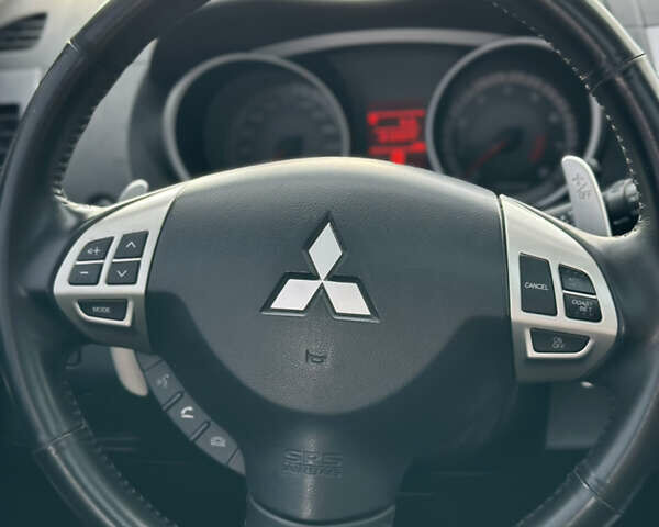 Черный Мицубиси Аутлендер ХЛ, объемом двигателя 2.4 л и пробегом 212 тыс. км за 9350 $, фото 12 на Automoto.ua