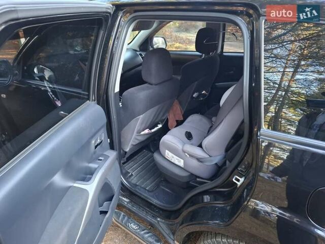 Черный Мицубиси Аутлендер ХЛ, объемом двигателя 2.4 л и пробегом 127 тыс. км за 10500 $, фото 19 на Automoto.ua