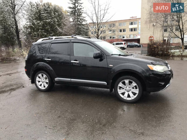 Чорний Міцубісі Аутлендер ХЛ, об'ємом двигуна 2 л та пробігом 306 тис. км за 9799 $, фото 10 на Automoto.ua
