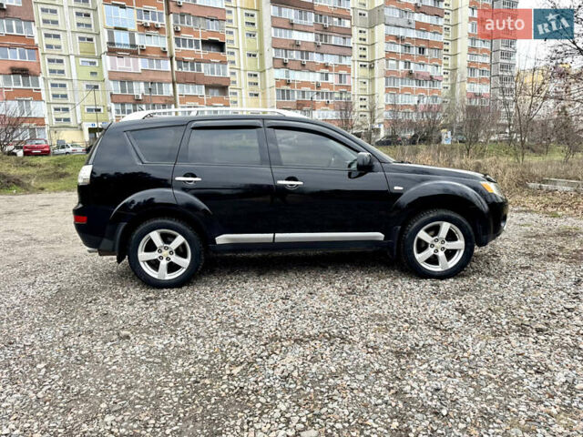 Чорний Міцубісі Аутлендер ХЛ, об'ємом двигуна 2.4 л та пробігом 229 тис. км за 9790 $, фото 7 на Automoto.ua