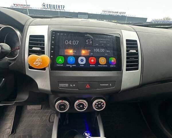 Черный Мицубиси Аутлендер ХЛ, объемом двигателя 2.36 л и пробегом 250 тыс. км за 10000 $, фото 17 на Automoto.ua