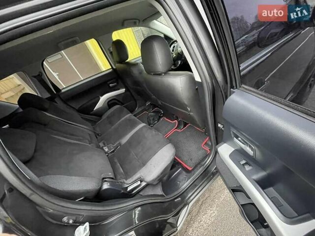 Черный Мицубиси Аутлендер ХЛ, объемом двигателя 2.4 л и пробегом 198 тыс. км за 9200 $, фото 12 на Automoto.ua