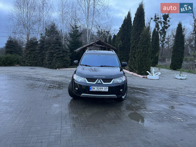 Чорний Міцубісі Аутлендер ХЛ, об'ємом двигуна 2.36 л та пробігом 230 тис. км за 9400 $, фото 20 на Automoto.ua