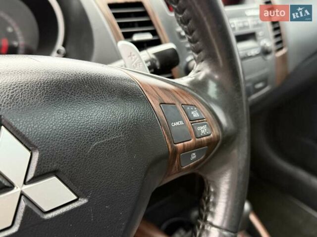 Черный Мицубиси Аутлендер ХЛ, объемом двигателя 2.36 л и пробегом 175 тыс. км за 9700 $, фото 21 на Automoto.ua