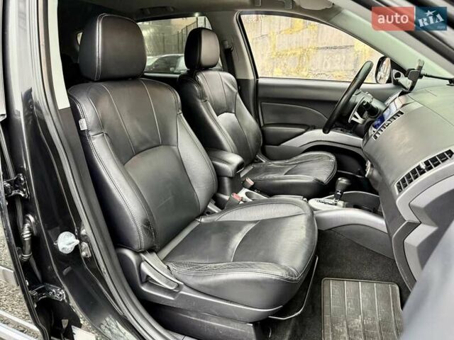 Черный Мицубиси Аутлендер ХЛ, объемом двигателя 3 л и пробегом 214 тыс. км за 9500 $, фото 11 на Automoto.ua
