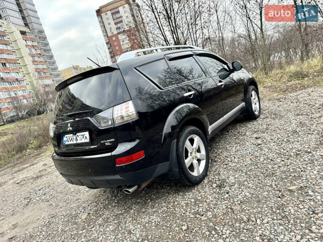 Чорний Міцубісі Аутлендер ХЛ, об'ємом двигуна 2.4 л та пробігом 229 тис. км за 9790 $, фото 6 на Automoto.ua